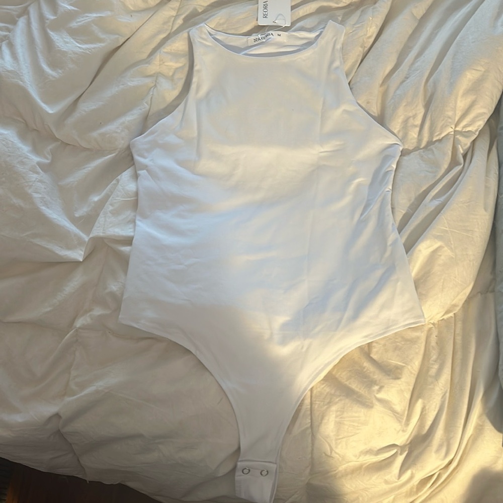 Reoria white bodysuit also Shapeware brand new size medium true to size.